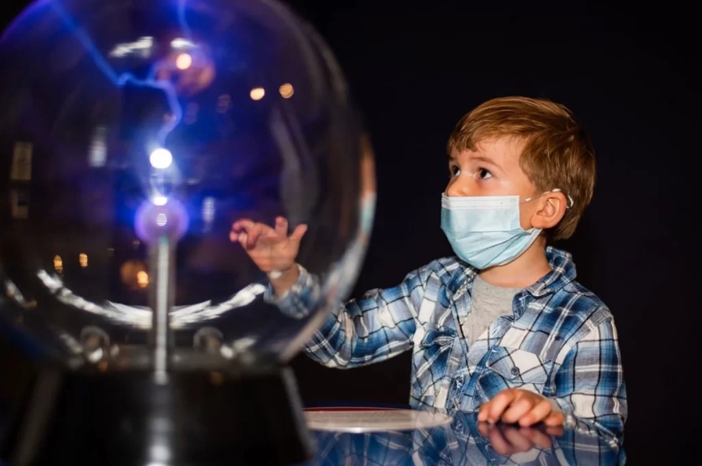 stock photo a child playing in a science center 1897146085 transformed