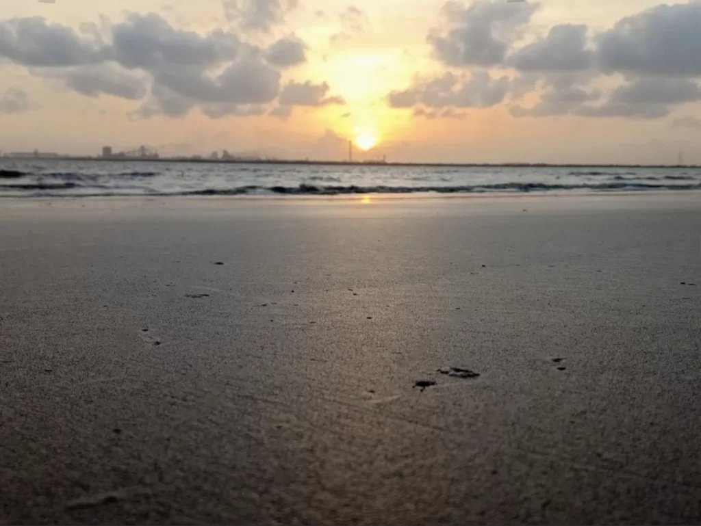 This is a picture of sunset at Dumas Beach, Surat. This place is famous for taking selfies.